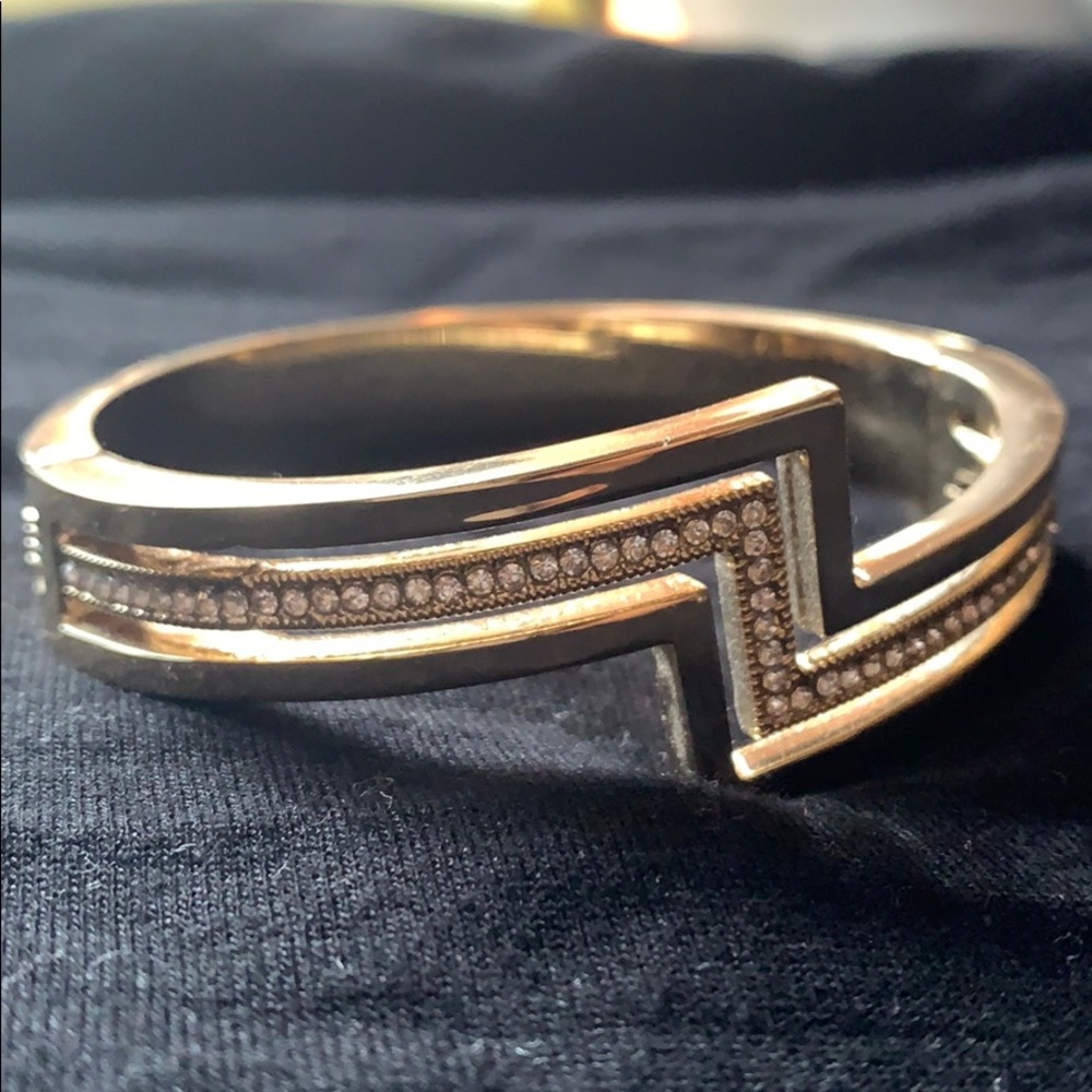Gold tone bracelet with cubic zirconia